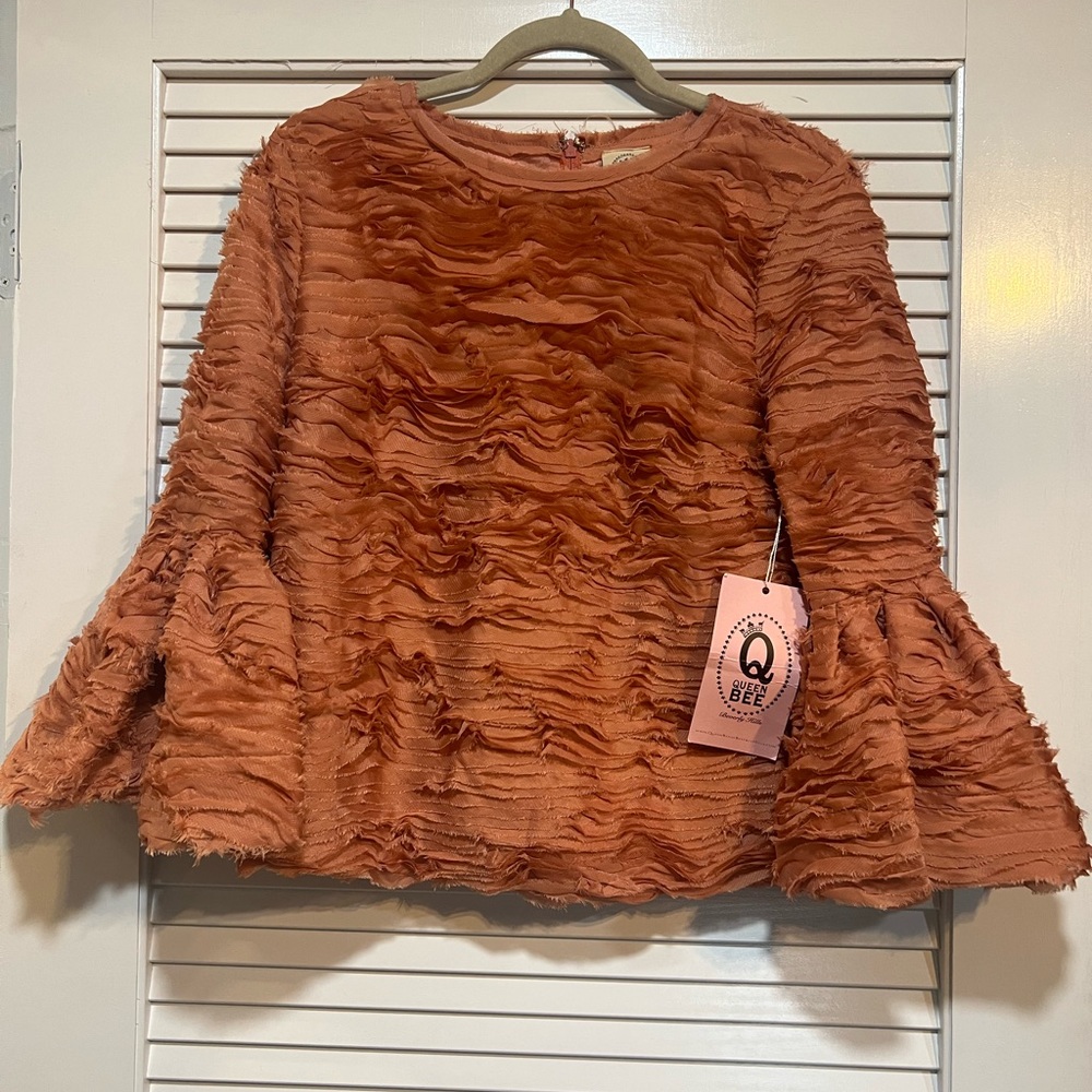 Plisse top with bell sleeve